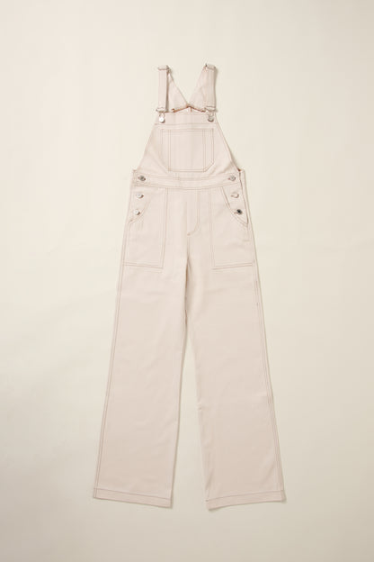 Une salopette dancing queen creme, en jean en aplat.
